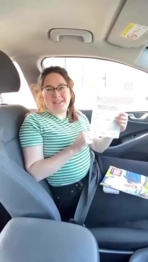 Video still: In the car after passing